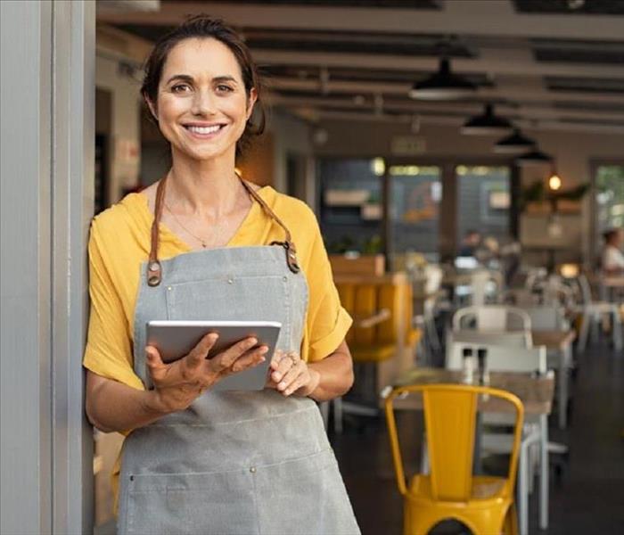 woman smiling in restaurant